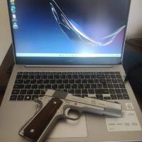 Pistolas y Rifles Colt