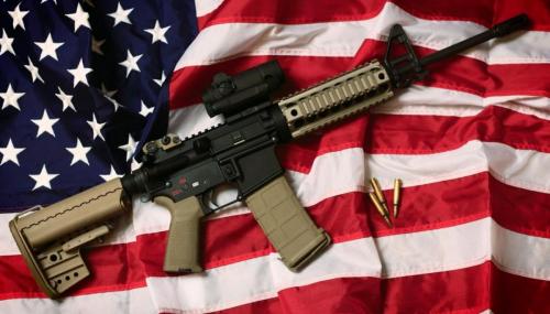 GettyImages-165894622-us-flag-gun-violence-1120
