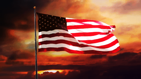 AMERICANFLAGWAVINGINSUNSET