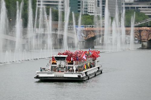 he delegations from Cameroon, Canada, the Central African Republic, Chile, and China sail on a boat during the opening ceremony of the Paris 2024 Olympic